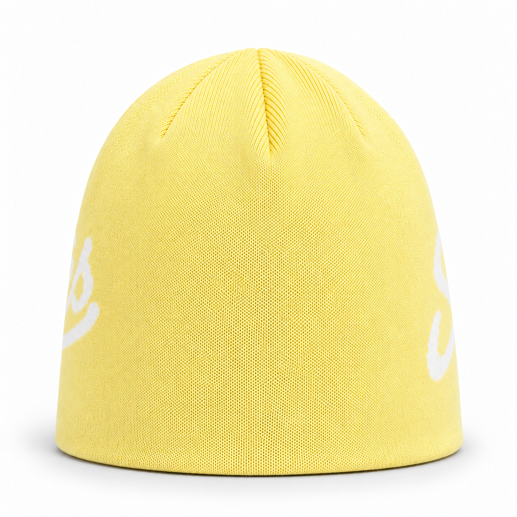 Butter yellow Après Club beanie, back view with the plain knitted crown