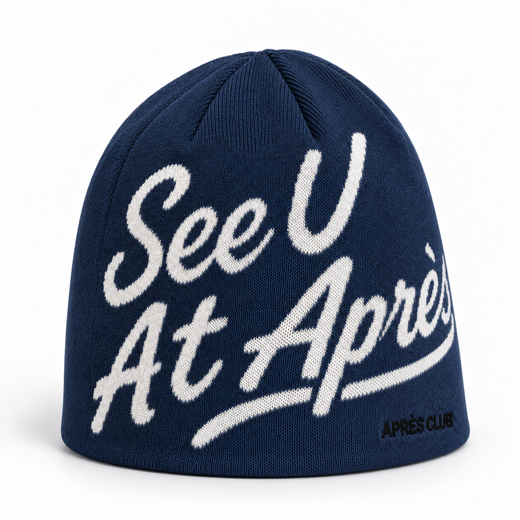 Navy Après Club beanie, left side view showing the skull-cap fit